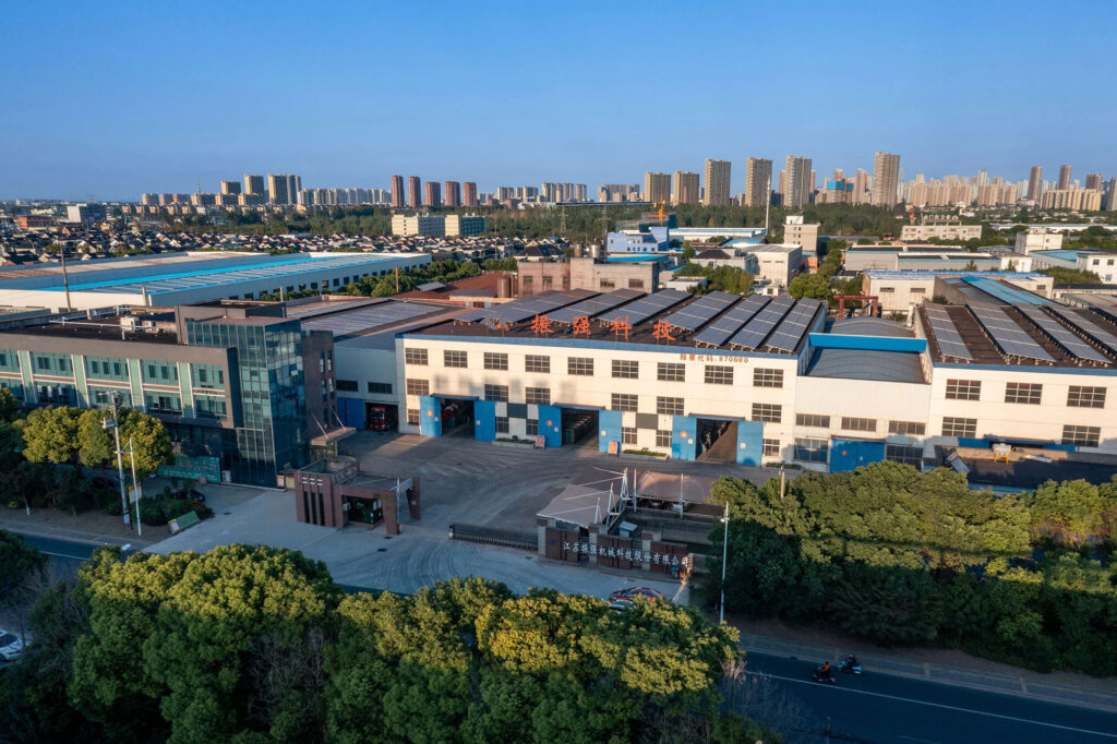 Aerial drone view of ZME mining equipment manufacturing base specializing in stone crushers and screening plants.